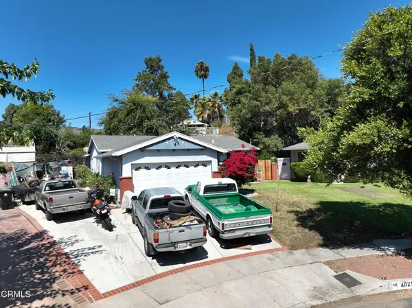 a car parked in front of a house