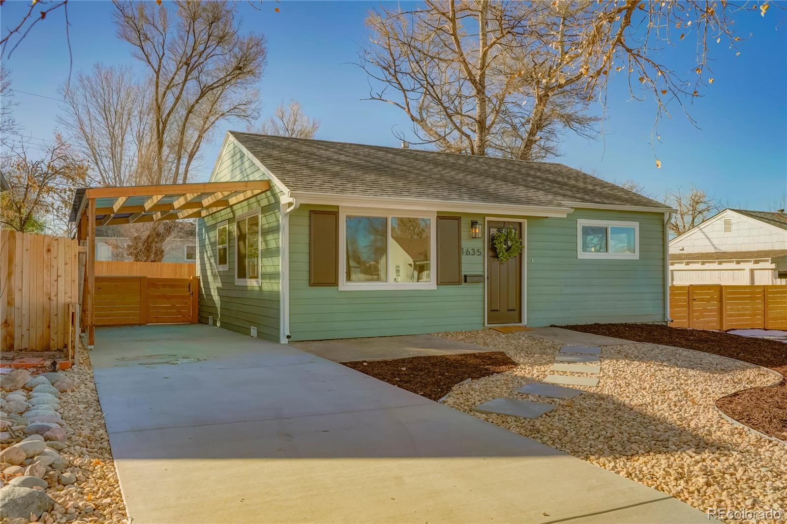 1635 South Raritan Street Denver, CO 80223 - Photo 14 of 17 a view of a house with a outdoor space