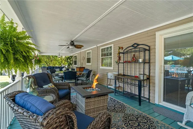a outdoor living space with furniture and garden view