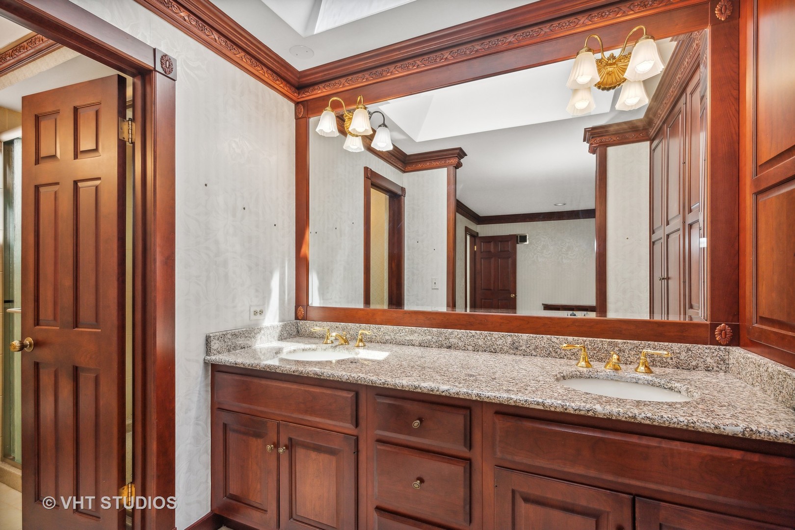26848 Highway 22 Barrington, IL 60010 - Photo 19 of 38 a bathroom with a granite countertop sink and a mirror