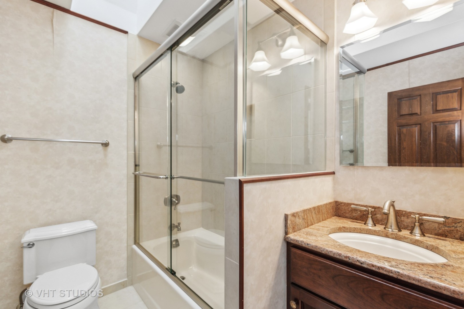 26848 Highway 22 Barrington, IL 60010 - Photo 21 of 38 a bathroom with a granite countertop sink toilet and shower