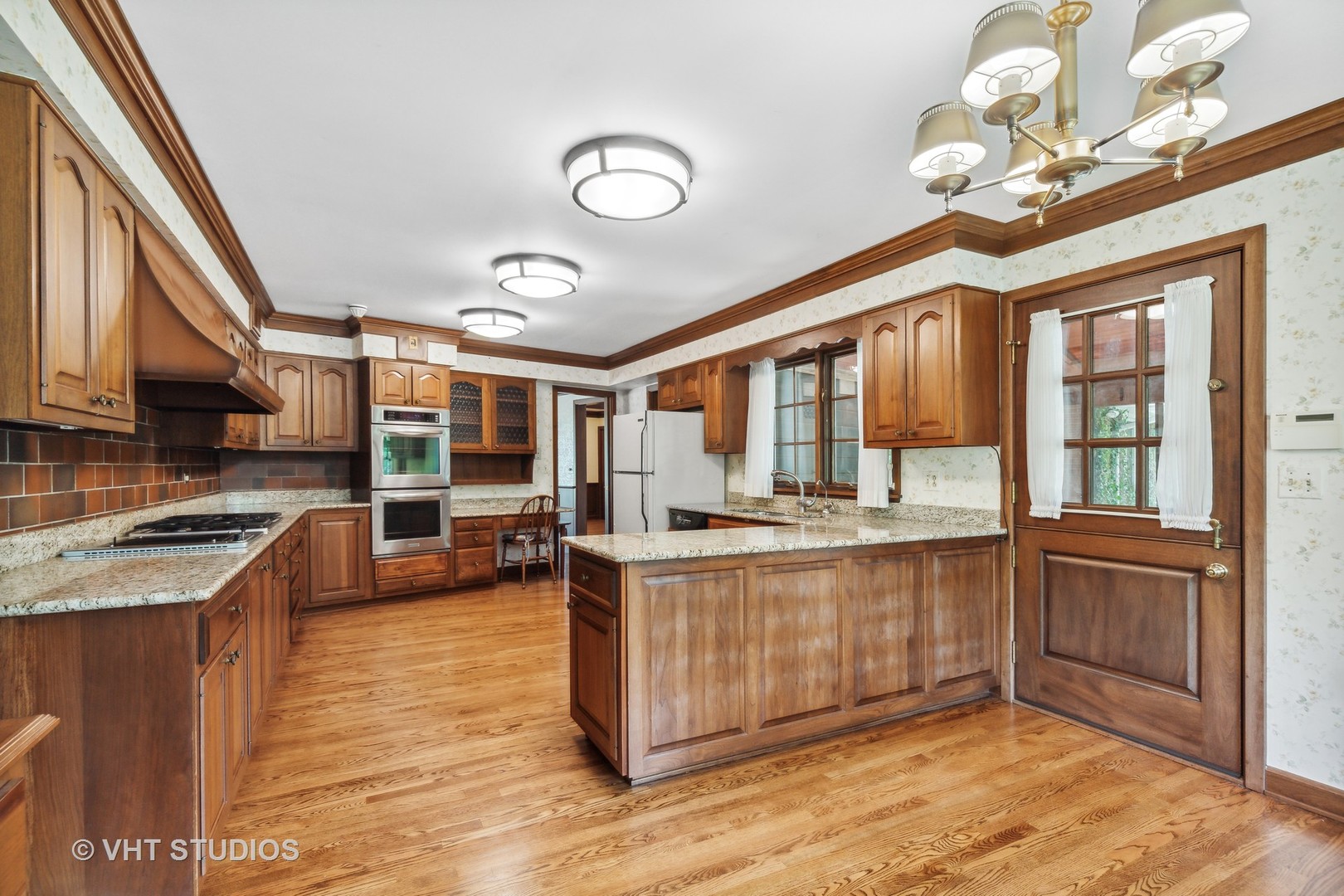 26848 Highway 22 Barrington, IL 60010 - Photo 8 of 38 a kitchen with stainless steel appliances granite countertop a stove and cabinets