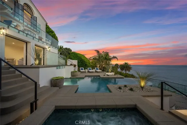 a living room with furniture fireplace and rug