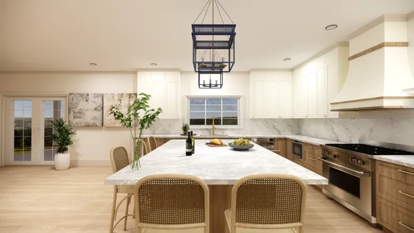 a large kitchen with a table and chairs