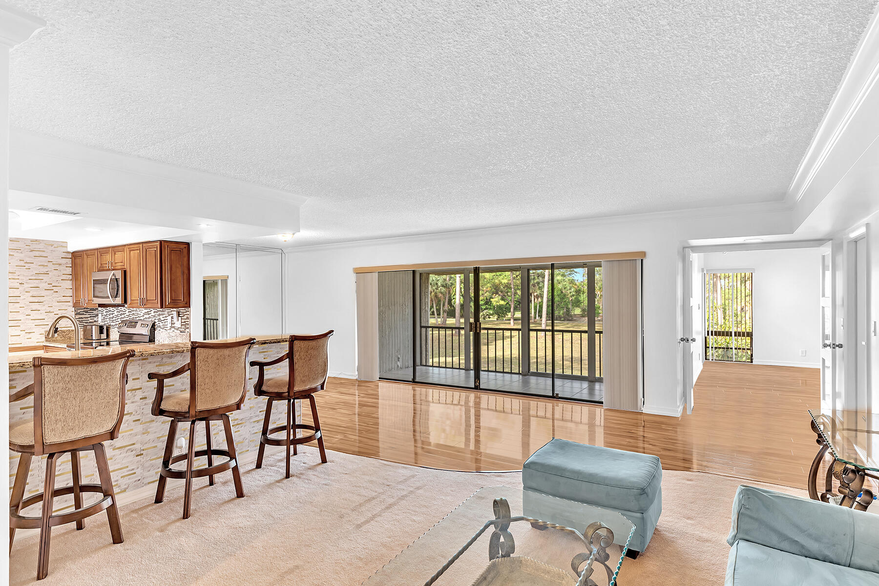 22039 Cocoa Palm Way, Unit 250 Boca Raton, FL 33433 - Photo 7 of 62 Kitchen Island and living