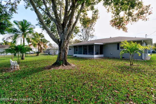 a garden view with a seating space