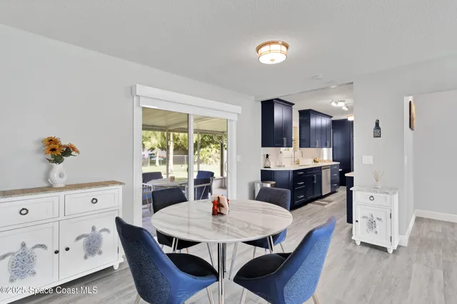 a view of kitchen with breakfast area