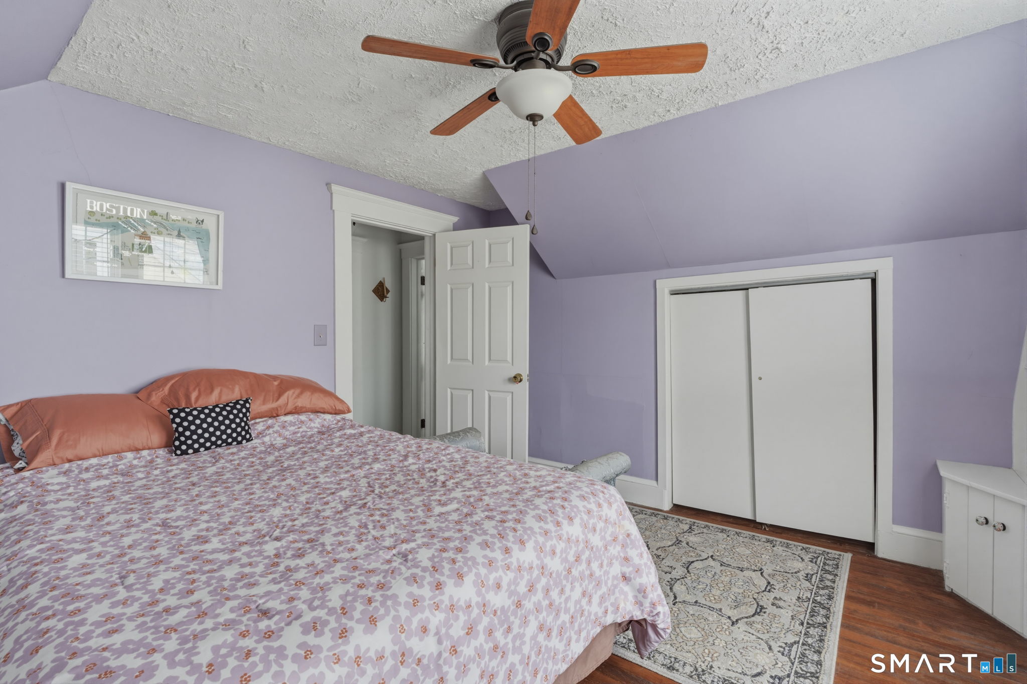 23 Benham Street Torrington, CT 06790 - Photo 22 of 28 a bedroom with a bed and a painting on the wall