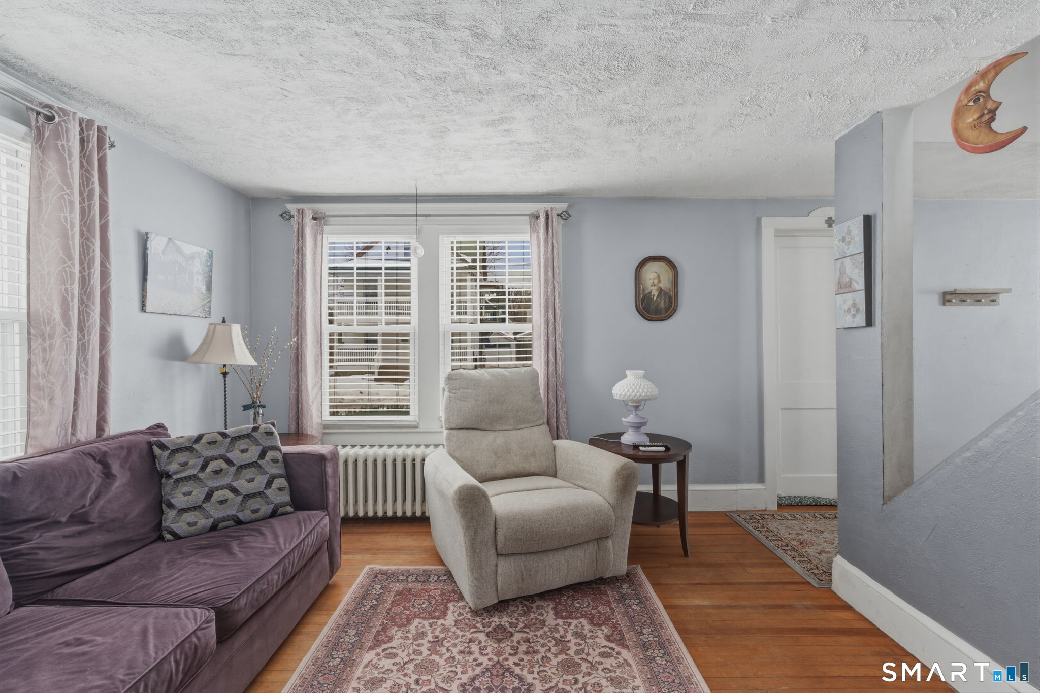 23 Benham Street Torrington, CT 06790 - Photo 27 of 28 a living room with furniture and a window