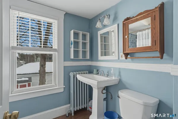 a bathroom with a sink and a toilet