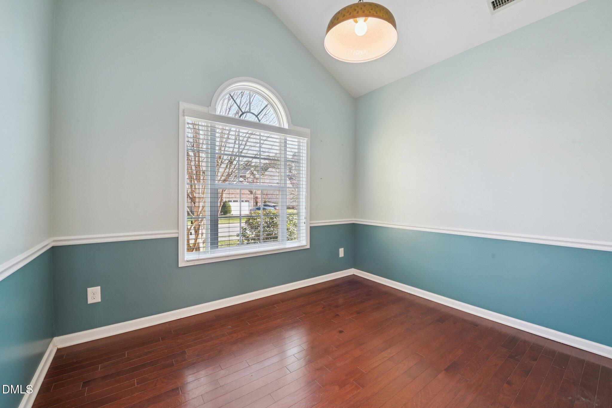 11 Hidden Ridge Court Durham, NC 27707 - Photo 4 of 30 an empty room with a window