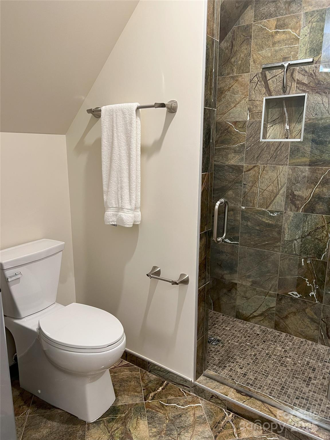57 Union Chapel Road Weaverville, NC 28787 - Photo 38 of 45 a white toilet sitting next to a bathroom