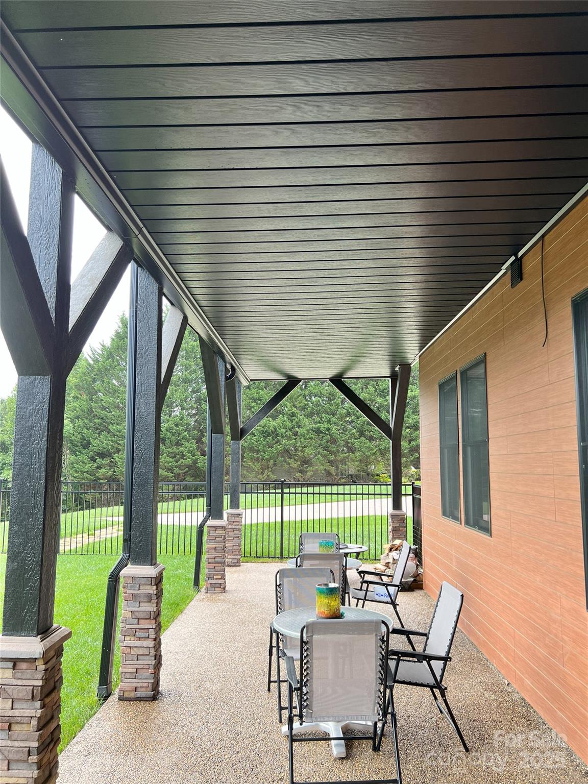 57 Union Chapel Road Weaverville, NC 28787 - Photo 6 of 45 a balcony with chairs and table