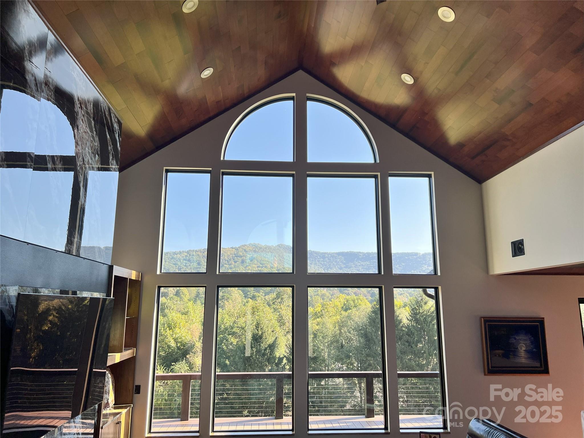 57 Union Chapel Road Weaverville, NC 28787 - Photo 9 of 45 a view of entryway with a large window and wooden floor