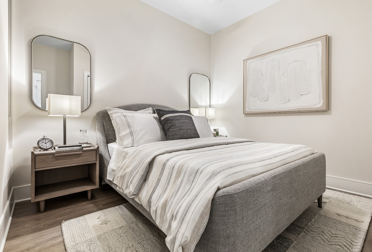 435 Madison Street, Unit 207 Oak Park, IL 60302 - Photo 16 of 21 a bedroom with bed and a night stand