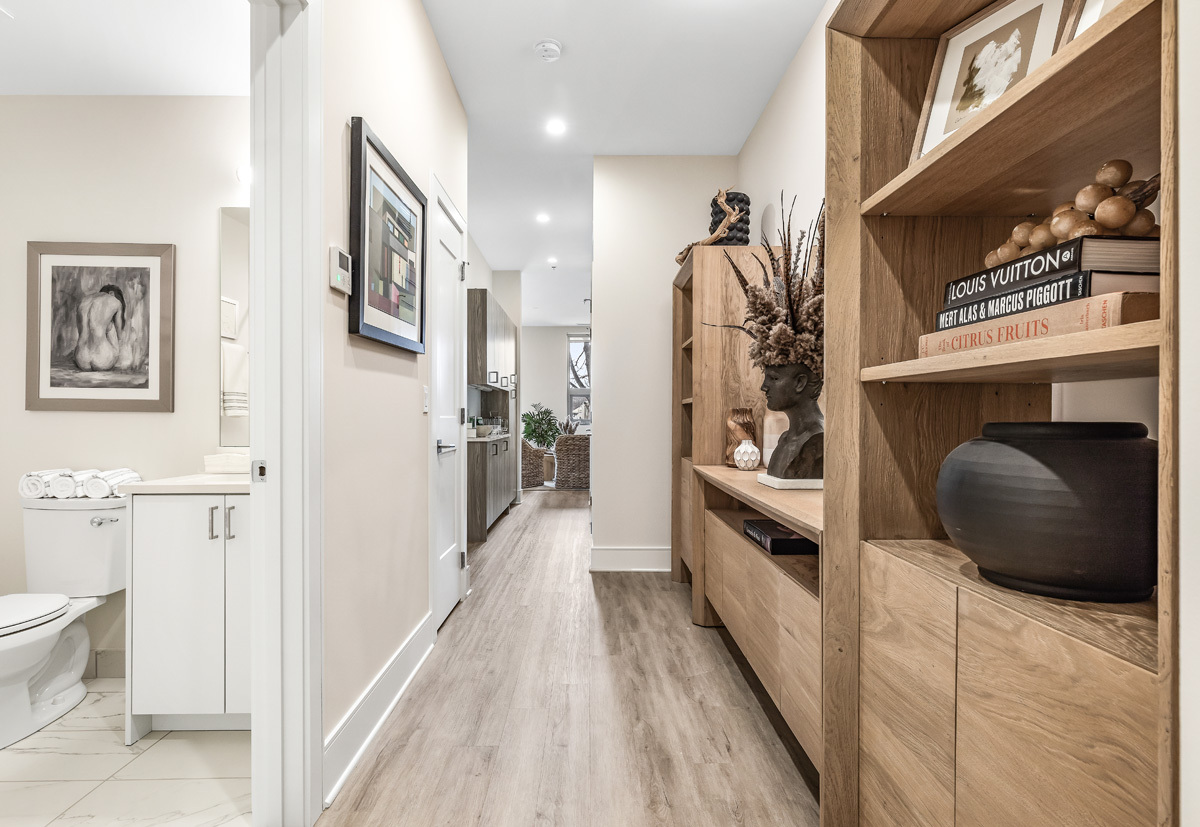 435 Madison Street, Unit 207 Oak Park, IL 60302 - Photo 8 of 21 a view of a hallway and a livingroom with furniture