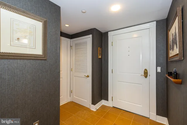 a view of livingroom with furniture and windows