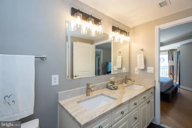 a view of a hallway with washer and dryer