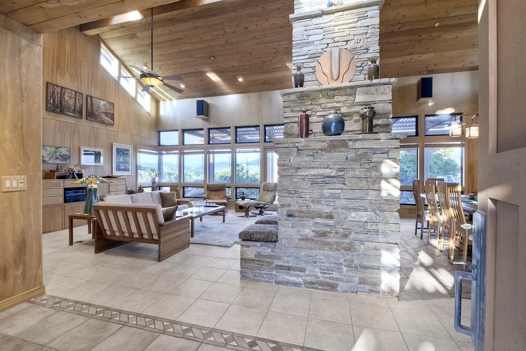 14825 Midland Road Poway, CA 92064 - Photo 15 of 33 a living room with fireplace furniture and a potted plant