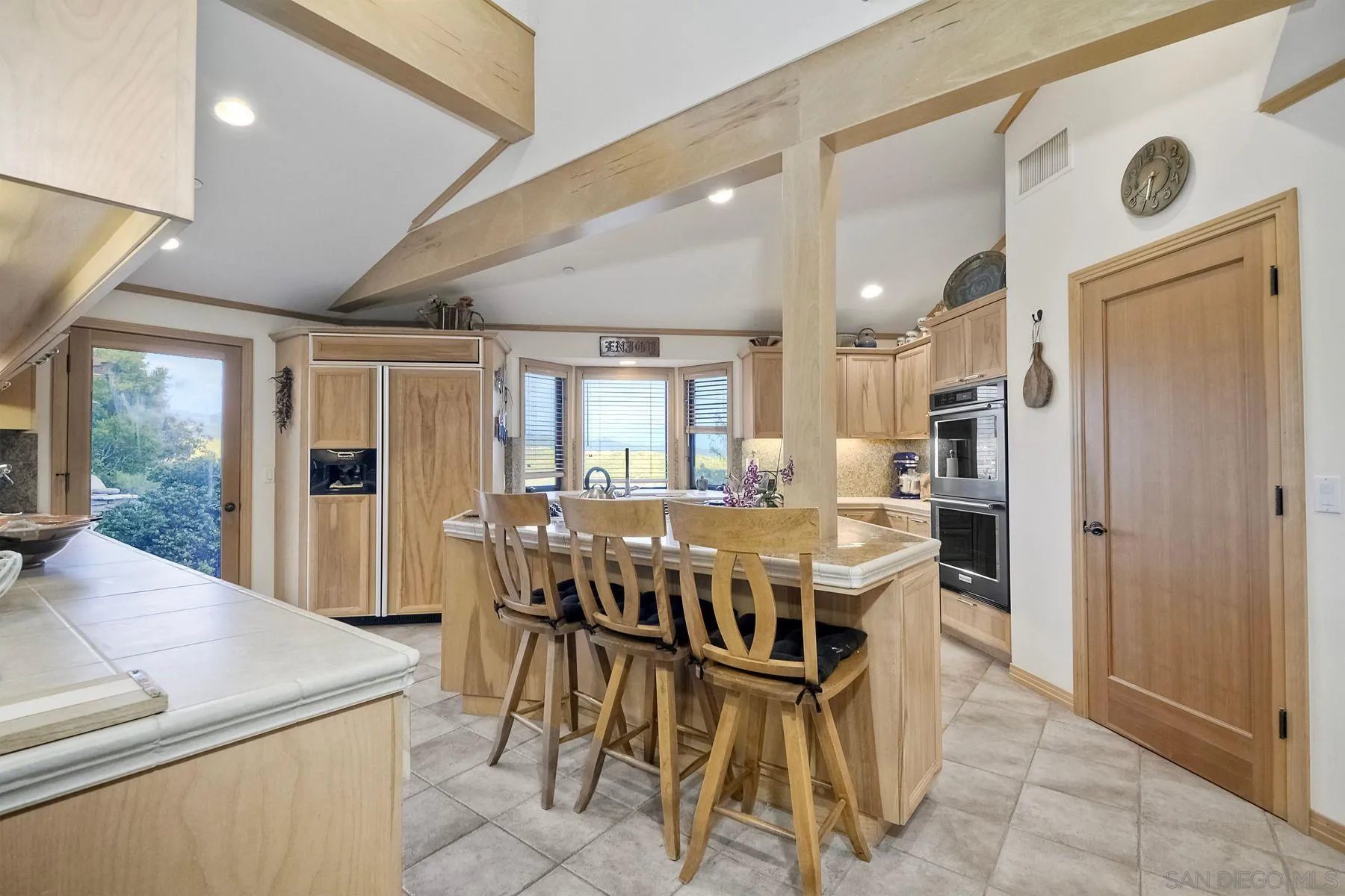 14825 Midland Road Poway, CA 92064 - Photo 18 of 33 a view of a dining room with furniture