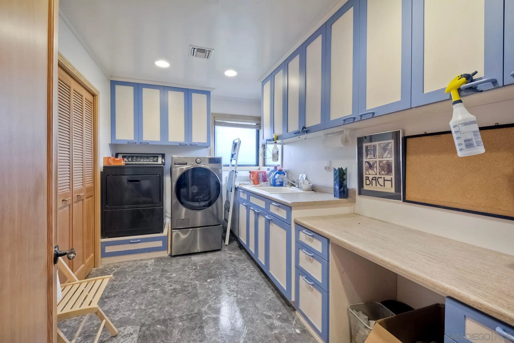 14825 Midland Road Poway, CA 92064 - Photo 24 of 33 a kitchen with stainless steel appliances granite countertop a sink and cabinets