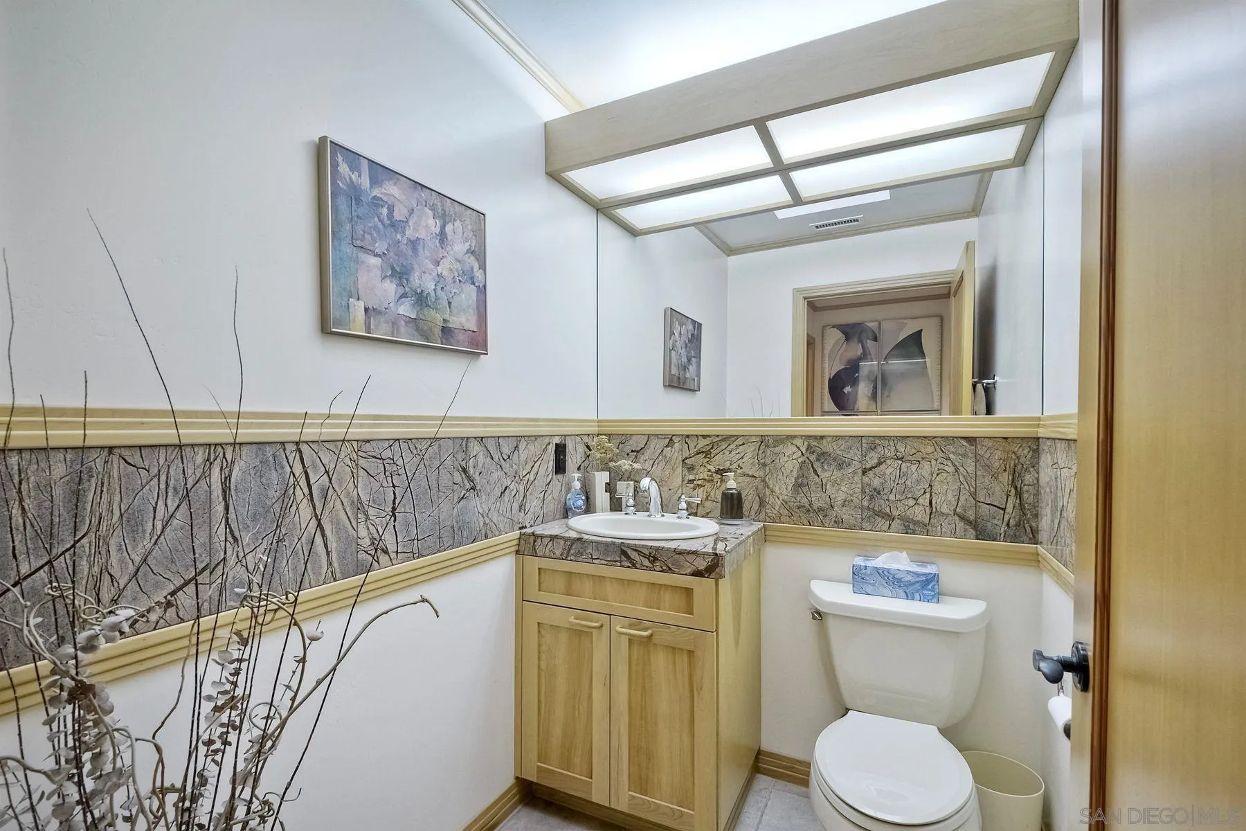 14825 Midland Road Poway, CA 92064 - Photo 26 of 33 a bathroom with a sink a toilet and mirror