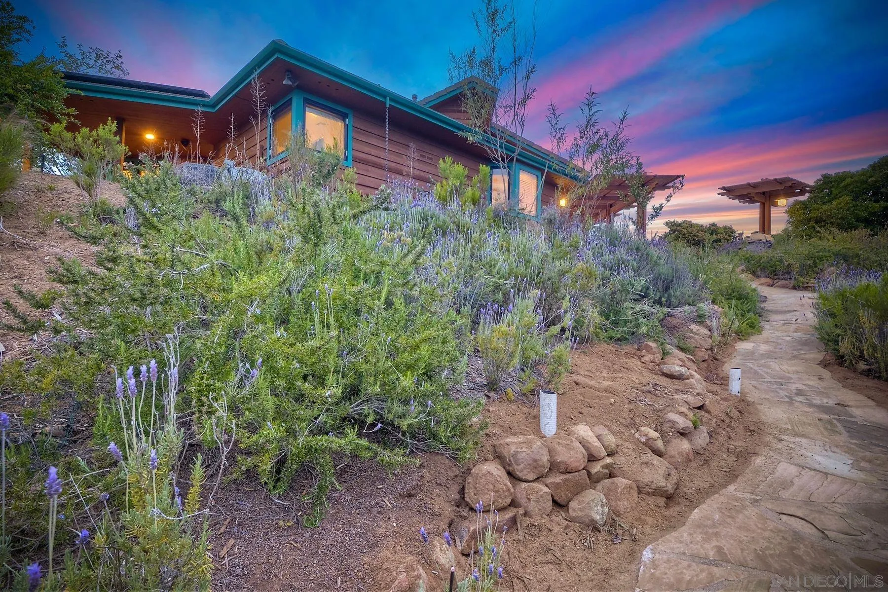14825 Midland Road Poway, CA 92064 - Photo 3 of 33 a view of a house with a small yard