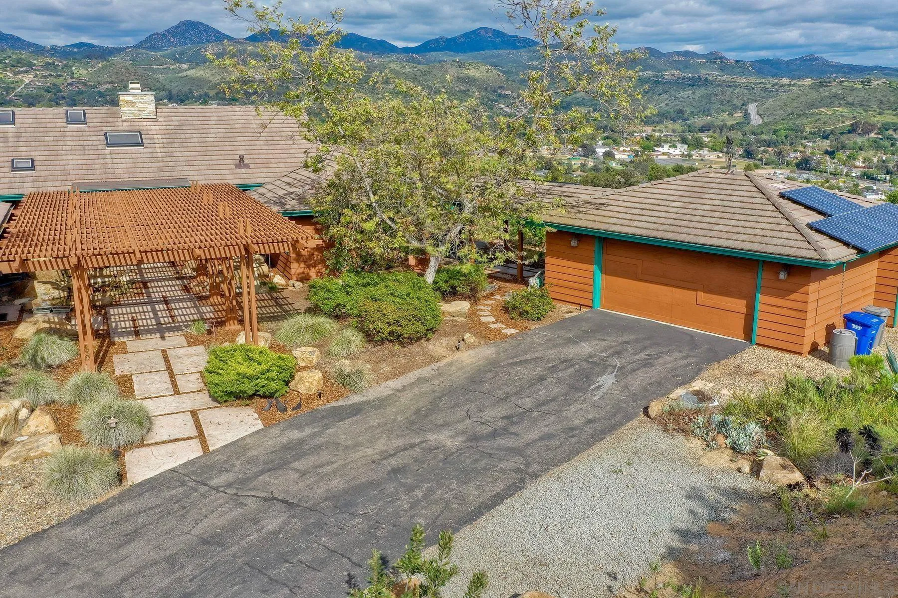 14825 Midland Road Poway, CA 92064 - Photo 5 of 33 an aerial view of a house with a yard
