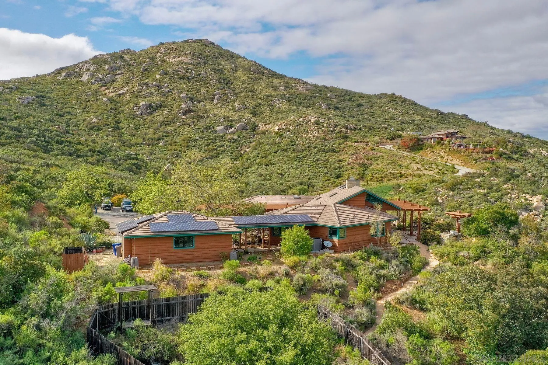 14825 Midland Road Poway, CA 92064 - Photo 6 of 33 a view of a house with a yard