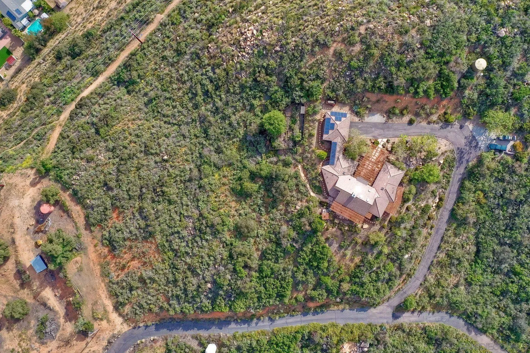 14825 Midland Road Poway, CA 92064 - Photo 7 of 33 a aerial view of a house with a yard