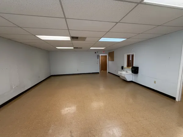a view of a room with kitchen
