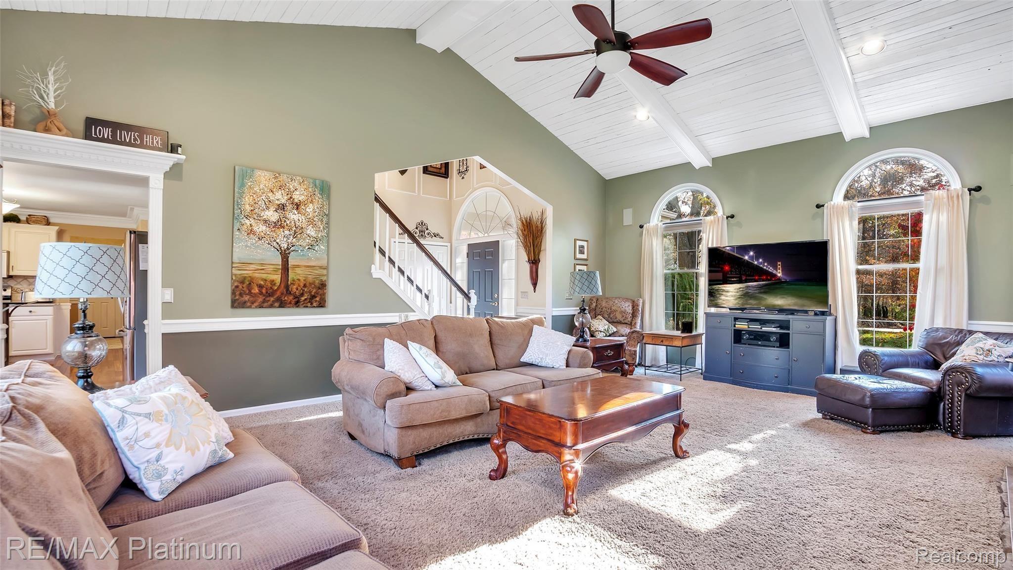 2439 Sunny Ridge Drive Pinckney, MI 48169 - Photo 7 of 42 Great Entertaining Space In This Grand Great Room With Custom Finishes