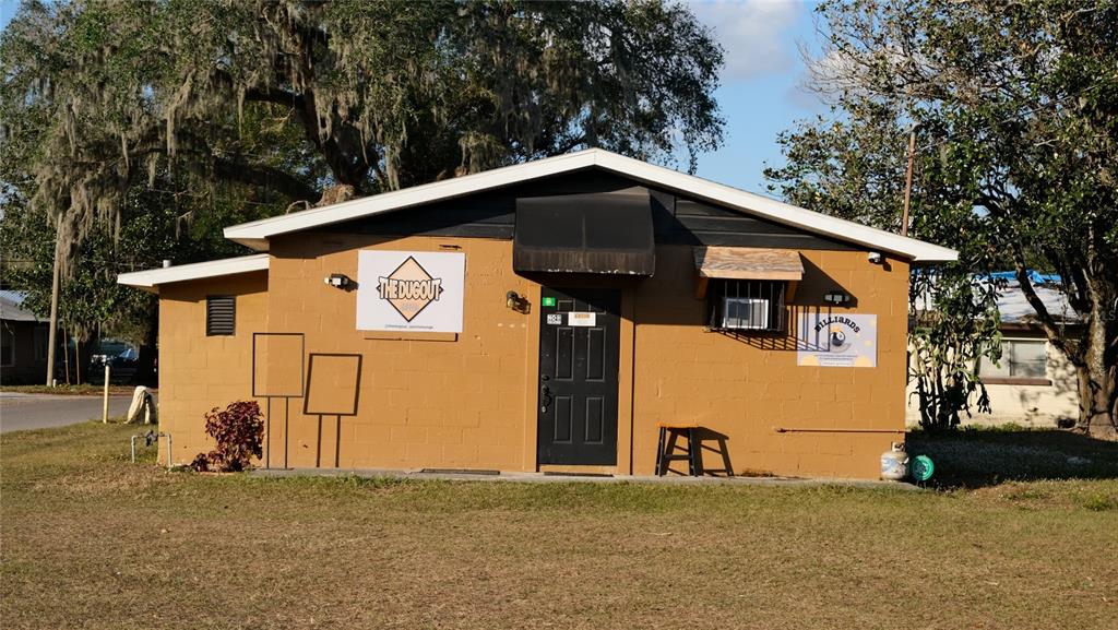 a front view of a house with a garage