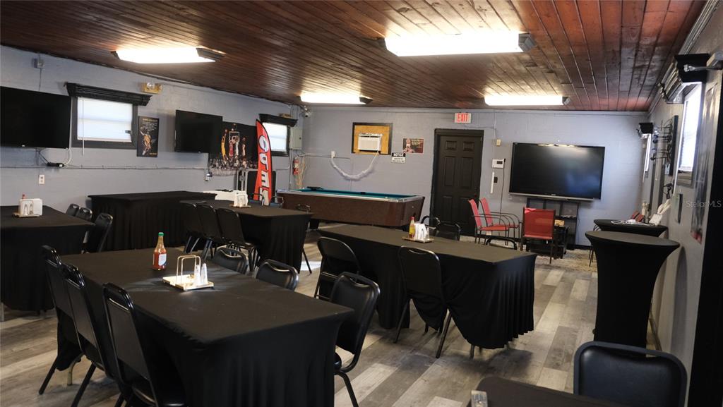 34 4th Street Southwest Fort Meade, FL 33841 - Photo 12 of 31 a dining room with furniture and wooden floor