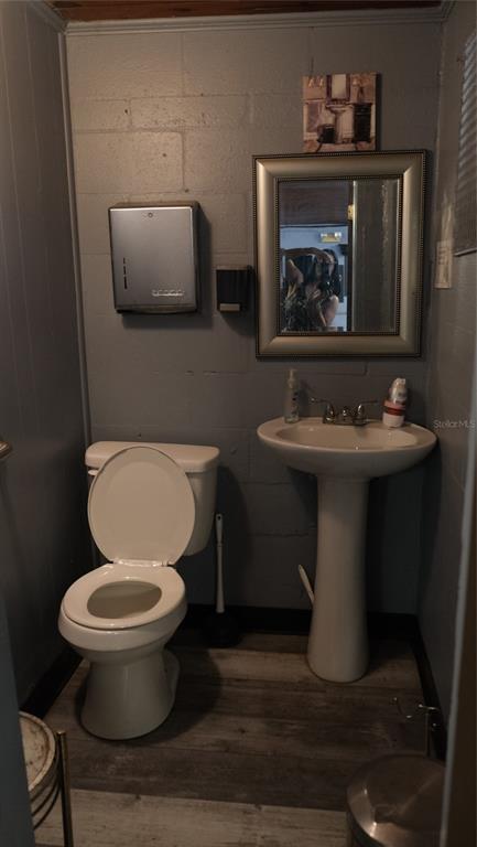 34 4th Street Southwest Fort Meade, FL 33841 - Photo 17 of 31 a bathroom with a toilet sink and mirror