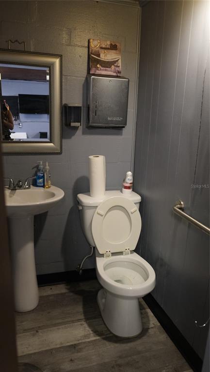 34 4th Street Southwest Fort Meade, FL 33841 - Photo 18 of 31 a white toilet sitting next to a bathroom sink