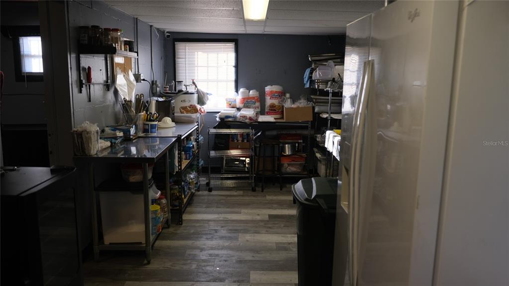 34 4th Street Southwest Fort Meade, FL 33841 - Photo 20 of 31 a room with lots of wooden furniture a mirror and a shower