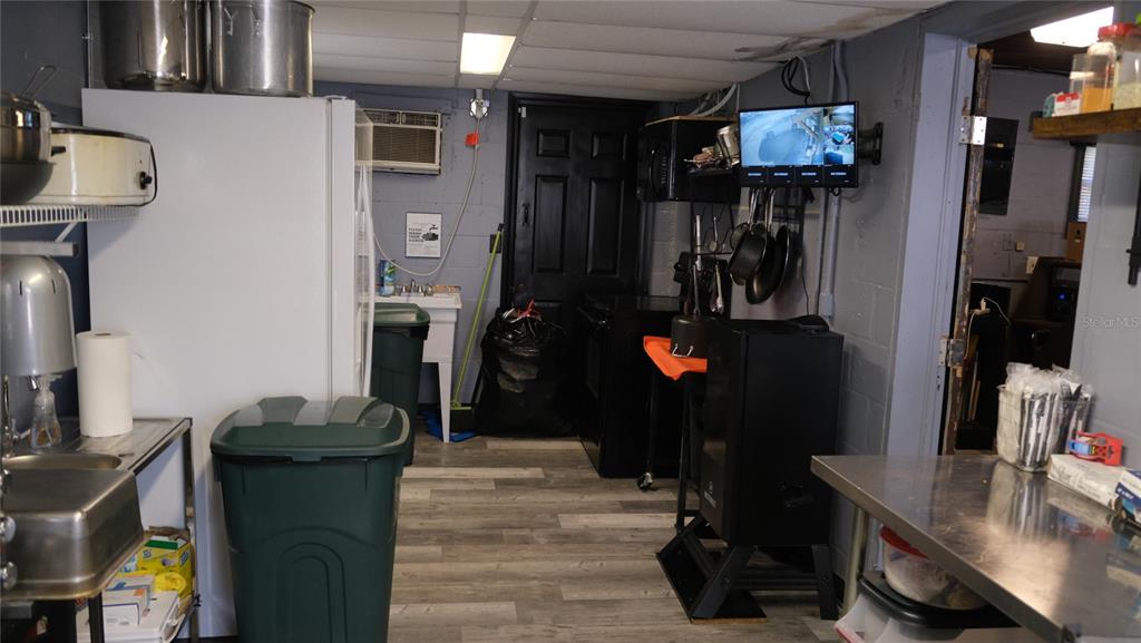 34 4th Street Southwest Fort Meade, FL 33841 - Photo 21 of 31 a room with a walk in closet and a mirror