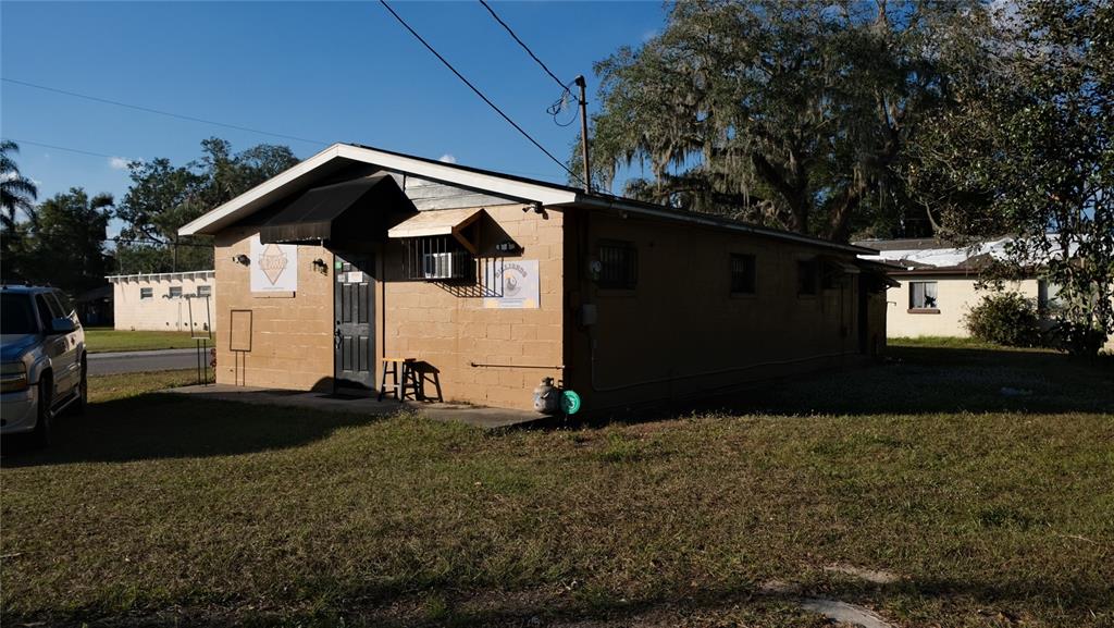 34 4th Street Southwest Fort Meade, FL 33841 - Photo 24 of 31 a front view of house with yard