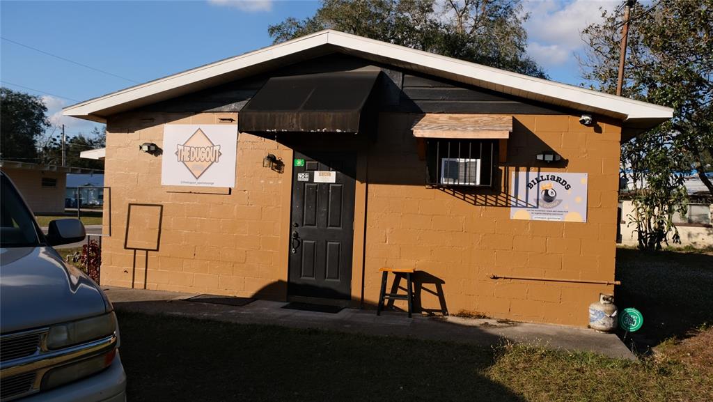 34 4th Street Southwest Fort Meade, FL 33841 - Photo 30 of 31 a front view of a house with a yard