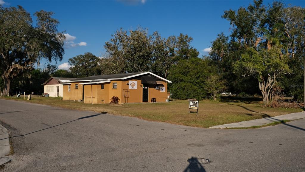 34 4th Street Southwest Fort Meade, FL 33841 - Photo 10 of 31 a front view of a house with a yard