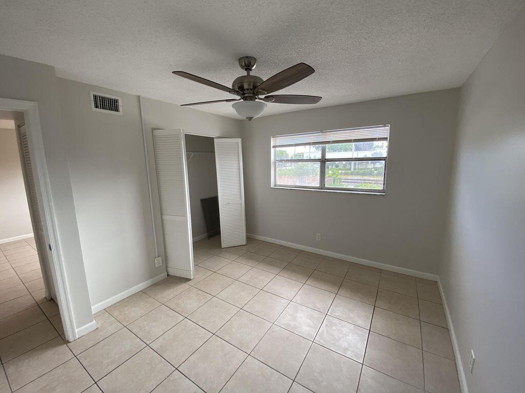 550 Southwest 2nd Avenue, Unit 229 Boca Raton, FL 33432 - Photo 9 of 16 Front bedroom
