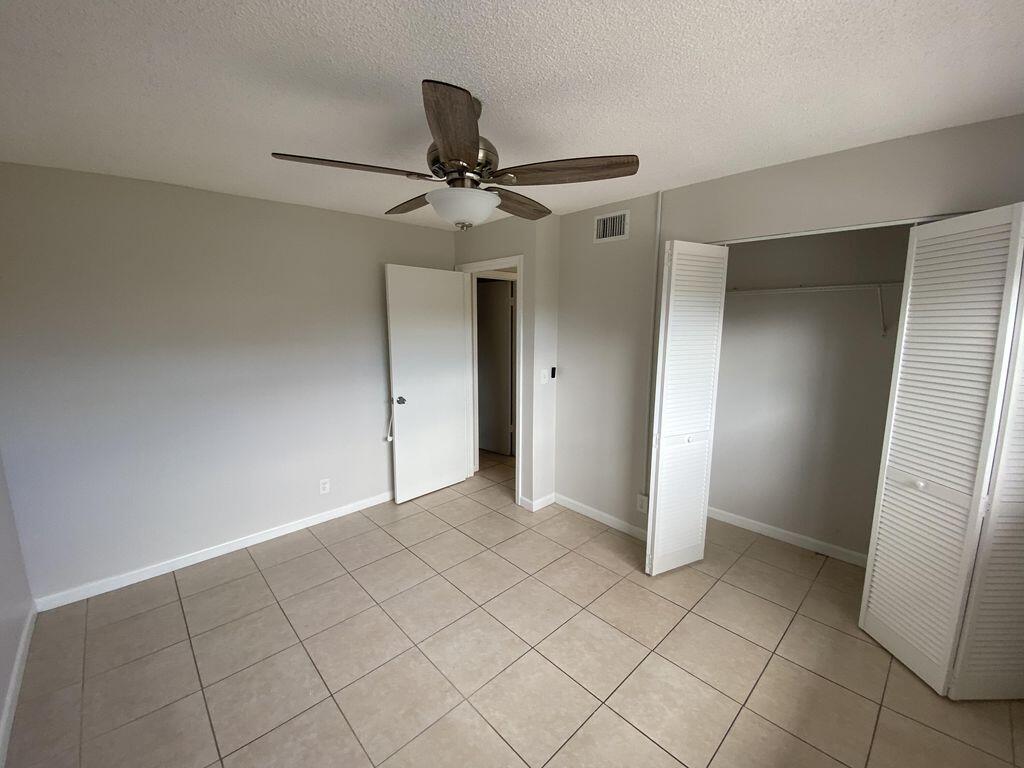 550 Southwest 2nd Avenue, Unit 229 Boca Raton, FL 33432 - Photo 10 of 16 Front bedroom closet