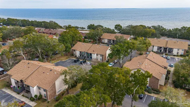 an aerial view of a house with a garden