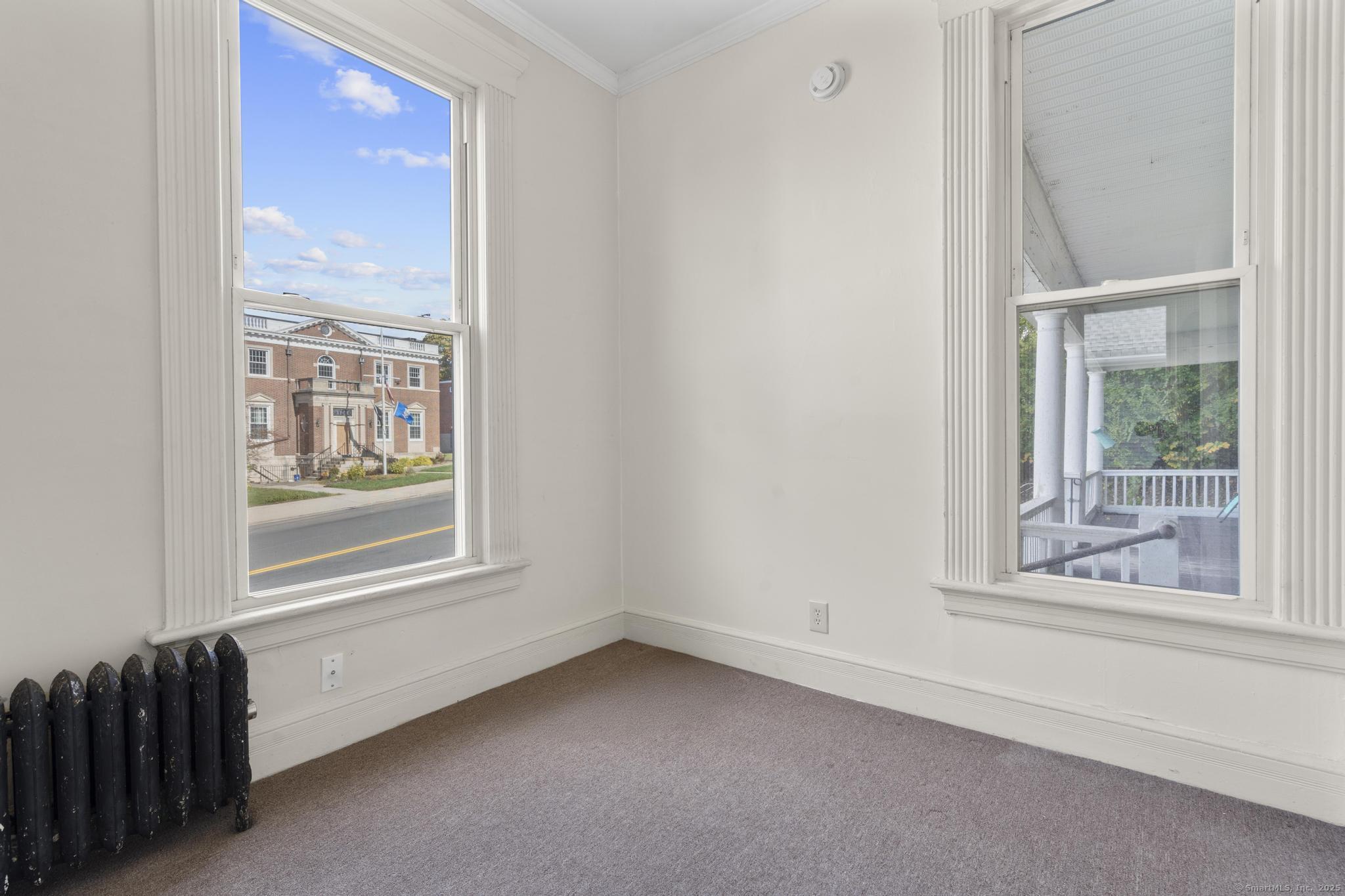 113 East Main Street, Unit 5 Meriden, CT 06450 - Photo 14 of 21 an empty room with a window
