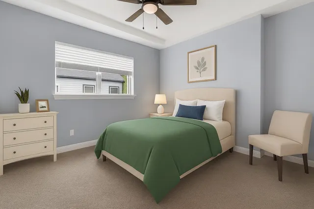 a bedroom with a bed and a dresser