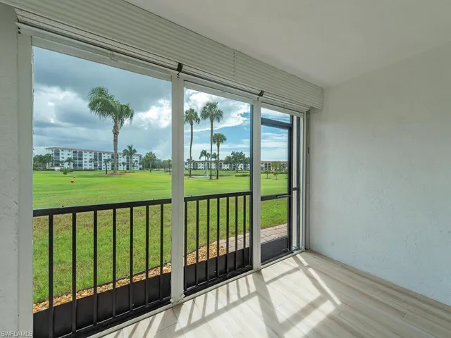 a view of a porch with a big yard