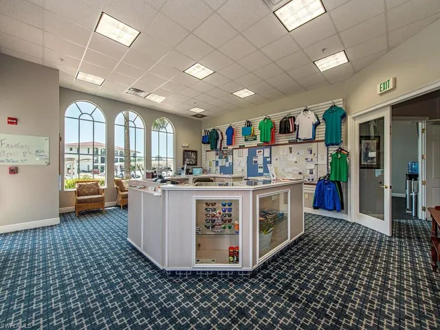 a kitchen with a stove a sink and a refrigerator