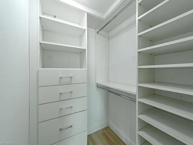 a view of an empty walk in closet
