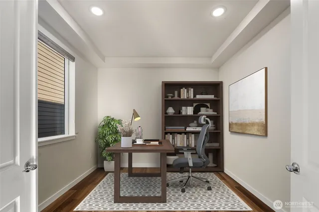 a workspace with furniture and window